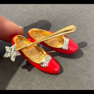 Ruby slippers with wand brooch